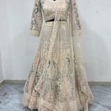 Lavish Peacock Soft Net Lehenga