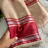 Launching this rich golden-beige and maroon silk saree