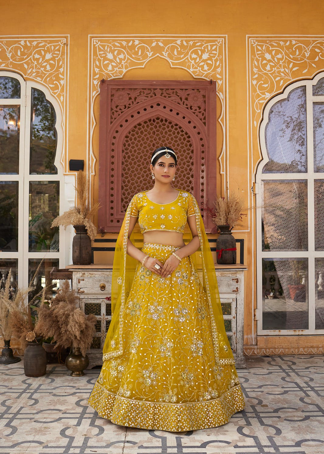 Mustard Sequance Embroidered Net Lehenga