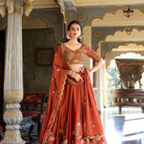 Glowing Orange Rangoli Silk Lehenga