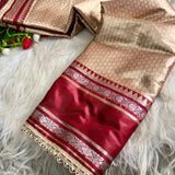 Launching this rich golden-beige and maroon silk saree