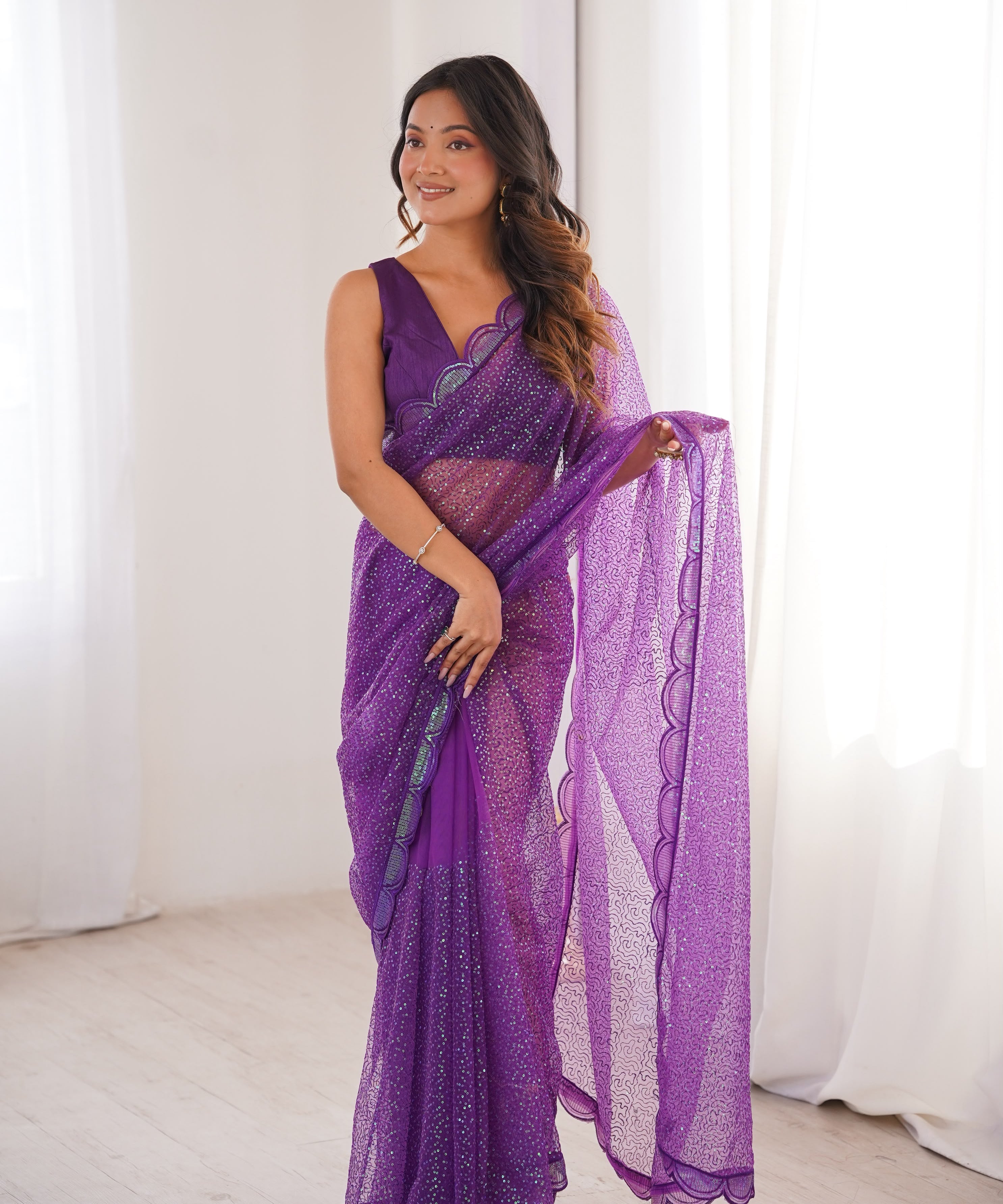 Shiny Heavy Soft Net Embroidered Saree
